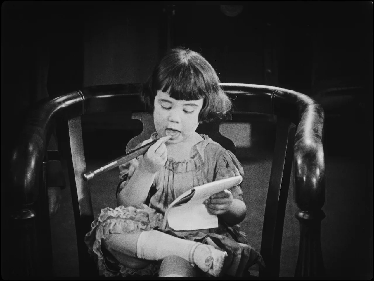 Frame from The Kid Reporter